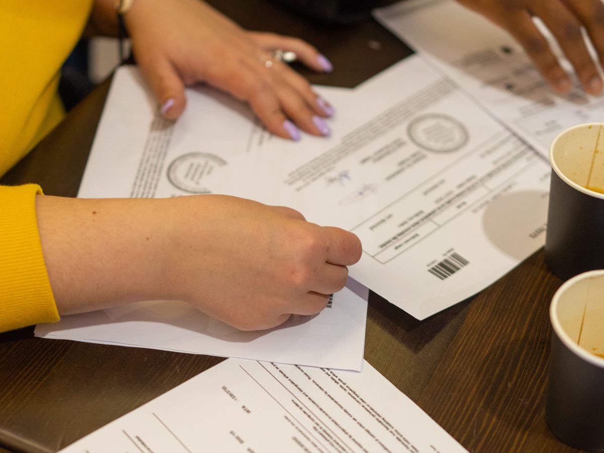 Official stamped and sealed documents spread across a desk